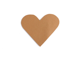 Blank brown heart shape cut from cardboard isolated on white background