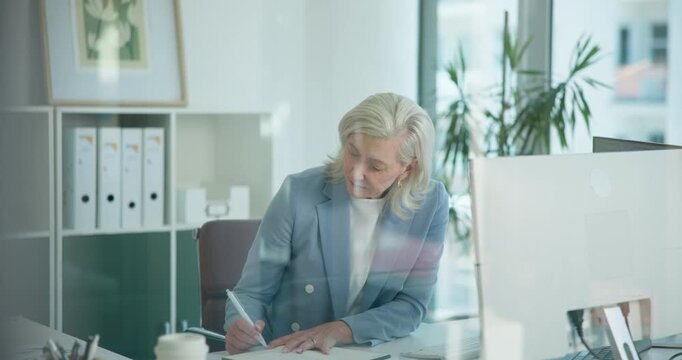 Business woman, notebook and writing with research in office for schedule, appointment reminder and report. Planning, calendar agenda and computer with mature employee in agency for checklist review
