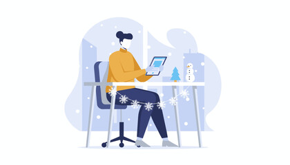 Winter remote work Person using tablet at festive desk during snowy weather