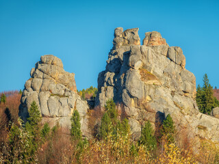 huge granite rocks in sunny day under blue sky