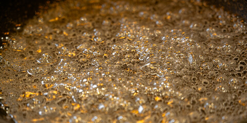 Boiling Caramel Bubbles Close-Up