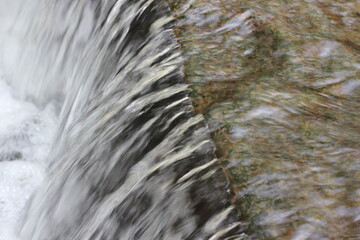 water flowing over rocks