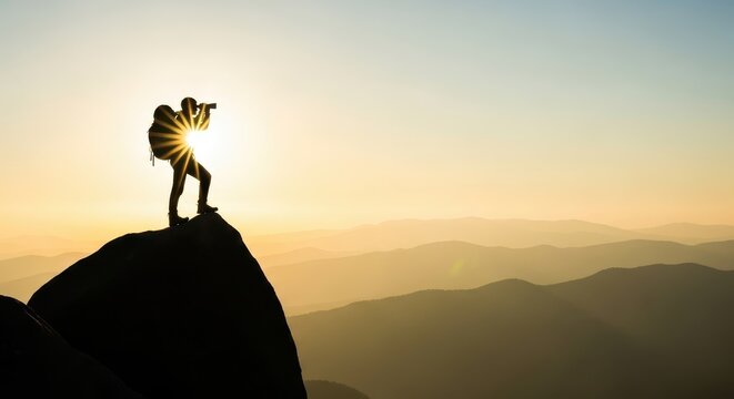 Silhouette of a hiker with a backpack standing on a mountain peak, looking through binoculars at the vast landscape during a radiant sunrise, symbolizing achievement and vision. - Powered by Adobe
