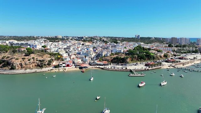 Aerial video from the little traditional touristic town Alvor in the Algarve Portugal