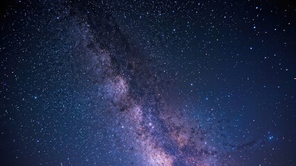 Fototapeta premium A clear view of the Milky Way galaxy in the night sky with numerous stars and cosmic dust.