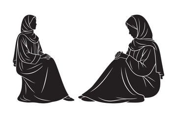 Two silhouetted women in hijabs sitting down