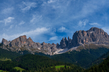 Panoramic view of the Rosengarten mountain range in the Dolomites, Italy.