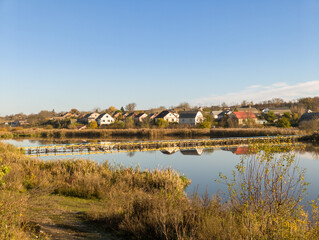A view of a small town with a bridge over a body of water