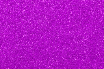 purple fuchsia glitter background in horizontal orientation ideal as a very sparkling wallpaper