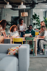 Diverse team collaborating in modern coworking office