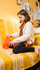 Happy father and child playing board game at home - happiness and family concept.
