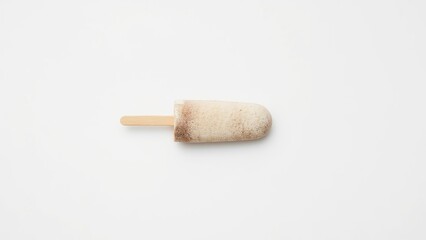 A picture of a vanilla ice cream bar with a wooden stick on a white background.