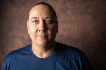 Portrait of a young Brazilian gentleman, portrait of a middle-aged man from Brazil, abstract background, selective focus.
