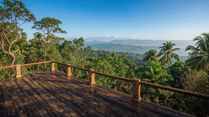 Obraz premium A wooden terrace overlooking lush green trees and distant mountains on a clear day.