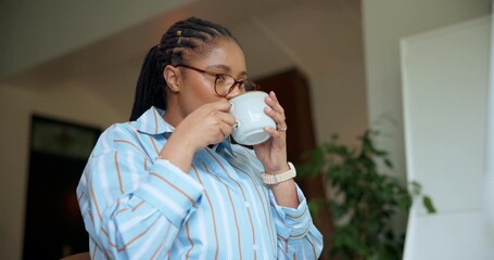 Drinking, coffee and woman in home, calm and start day with warm beverage in apartment and thinking. Morning, mindfulness and black person with tea for health benefits, liquid and caffeine boost