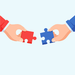 Hands holding puzzle pieces representing teamwork and collaboration for success.