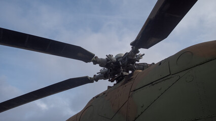 helicopter part inspection, inspection of helicopter rotor blades and mechanical linkages seen closely