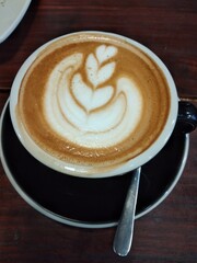 cup of cappuccino with cinnamon