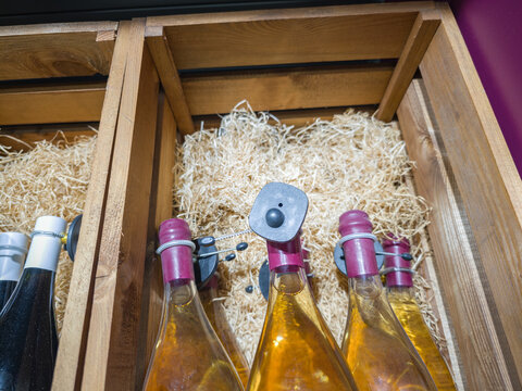 The bottles are all different colors and sizes - Powered by Adobe