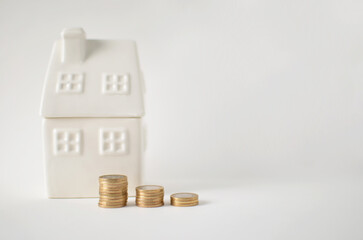 House model showing increasing money saving for home ownership