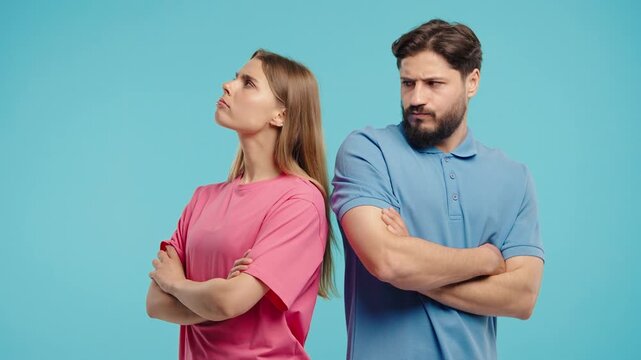 Young Offended Couple After Quarreling, Standing Back. Selfishness, Resentment 