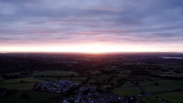 Atmospheric Sunset Over Rural Welsh Countryside