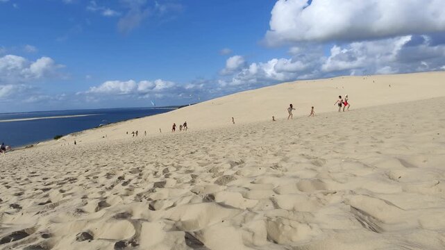 People paragliding at the Great Dune of Pilat, Arcachon Basin, Nouvelle Aquitaine, France.