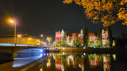 View of the river Oder and the National Museum in the night in Wroclaw, Poland.