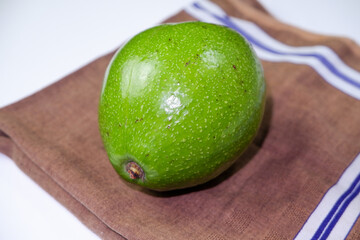 Fresh Whole Avocado Isolated with Natural Green Texture