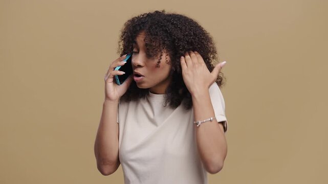 Annoyed Outraged African Woman Quarreling Talking On Mobile Phone. Angry Lady 