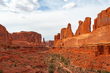 Fototapeta premium Arches National Park, USA - a wonderland with its red-rock formations, stone arches, giant rocks, pinnacles and trails