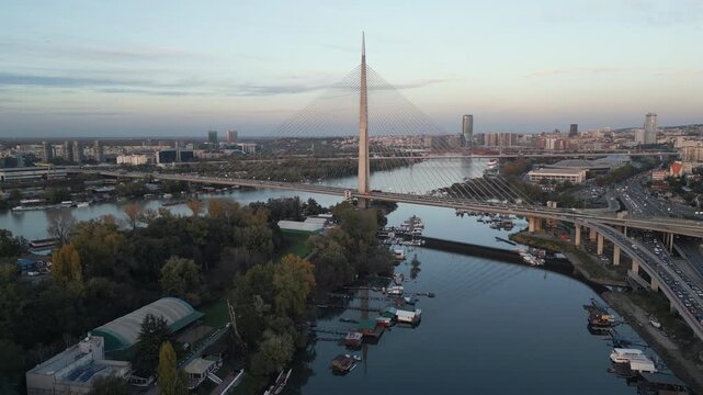 Cinematic drone video showcase the Ada Bridge at dusk, Belgrade, Serbia. 