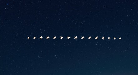 A line of twelve white stars against a dark blue night sky