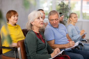Adult students listening in the classroom university