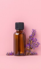 Amber Bottle of Essential Oil Rests With Sprigs of Lavender Against a Soft Pink Background on a Peaceful Afternoon