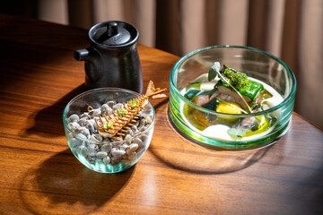 Gourmet dish with artistic presentation on a wooden table, fine dining concept