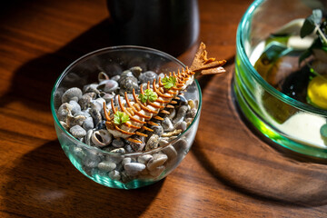 Artistic seafood dish with a unique presentation in a glass bowl