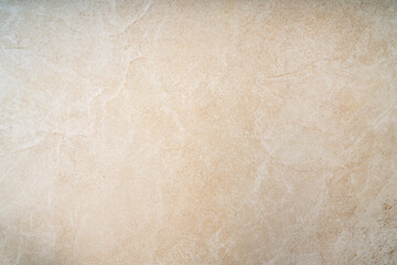 Beige marble texture background with subtle natural stone pattern, smooth surface, and soft neutral color, ideal for interior design, flooring, or wall decoration projects