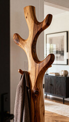 Artistic Wooden Sculpture Coat Rack for Modern Entryways create with ai