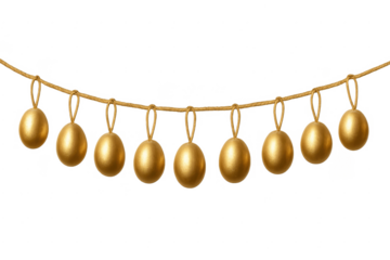 Golden easter eggs hanging on string garland decoration