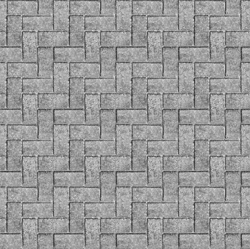 Brick paving pattern - Repeating cobblestone seamless background texture in gray herringbone masonry weave typically found in developed areas. Often seen in a town, pavement, patio or driveway.