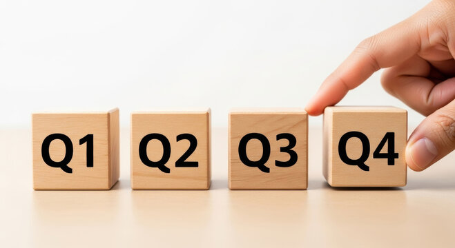 Q4 business year end review 2026 2025 new year progress planning goals finger touching wooden block