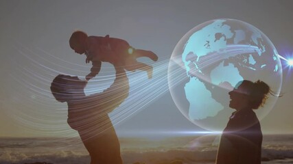 Dad lifting baby after baby's reach, mom reaching, beach sunset globe graphic linking family tech - Powered by Adobe