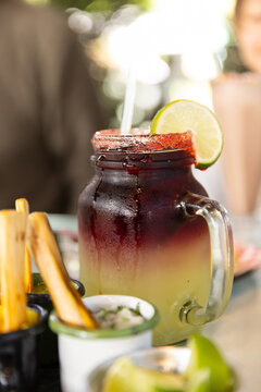 lemonade sangria in mason jar in bright restaurant daylight