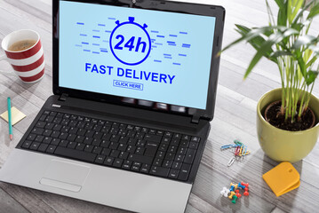 Fototapeta premium Fast delivery concept on a laptop