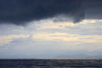 Heavy rain falls on a region in the Aegean Sea before a storm