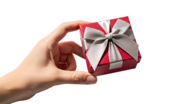 Hand holding a small red gift box with a white ribbon and bow against a dark background