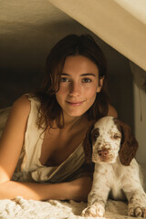 cheerful man wearing red hat waves warmly at his neighbors while smiling brightly