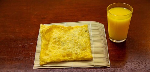 Fried Pastels, Brazilian-style street fair pastries, in an original and typical setting. Sugarcane juice, orange juice, and coconut water.