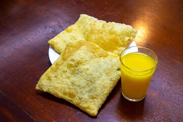 Fried Pastels, Brazilian-style street fair pastries, in an original and typical setting. Sugarcane juice, orange juice, and coconut water.